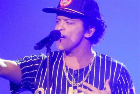 does bruno mars write his own music? how does he balance creativity with commercial success?